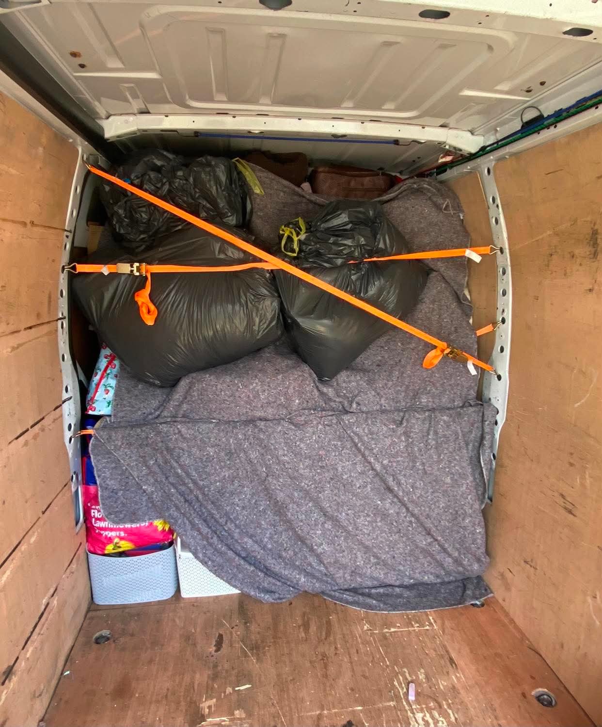 Items carefully strapped and secured in the back of a removal van